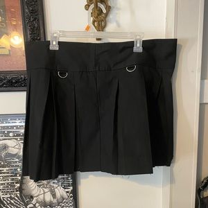 black pleated mini skirt